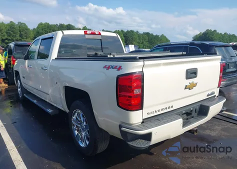 2015 Chevrolet Silverado 1500 High Country из США, поврежденный, VIN 3GCUKTEC9FG363188